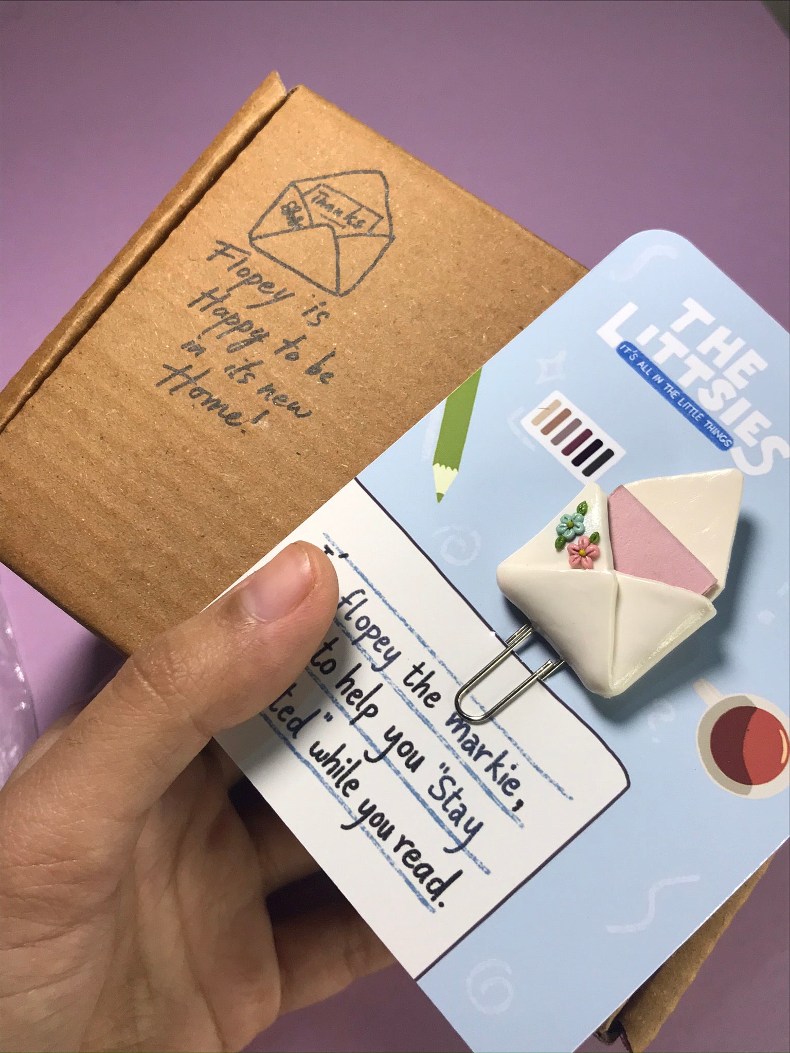 Flopey polymer clay bookmark with branded packaging box