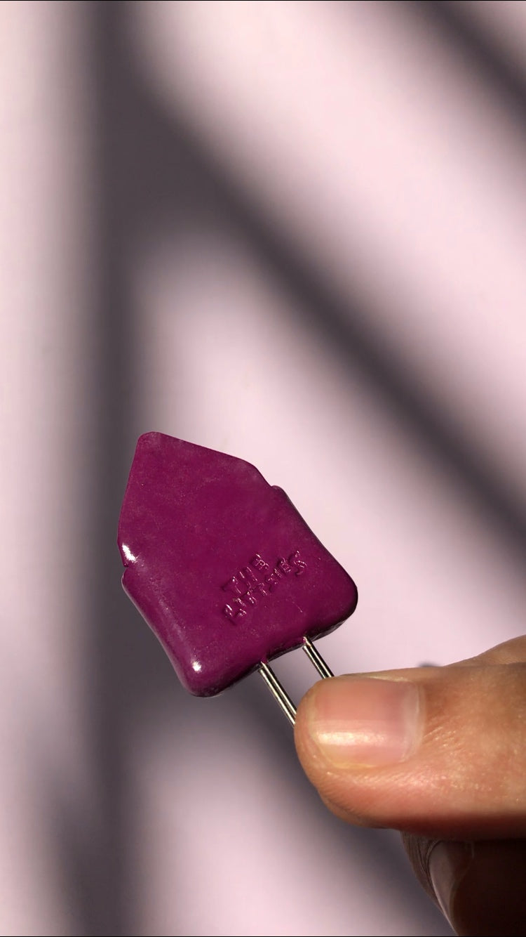 Back of Flople purple polymer clay bookmark with Craft a Happy Life stamp