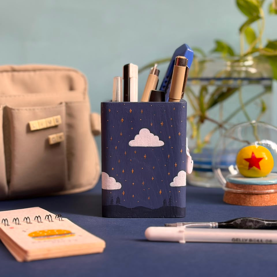 Back view of navy celestial desk pen holder