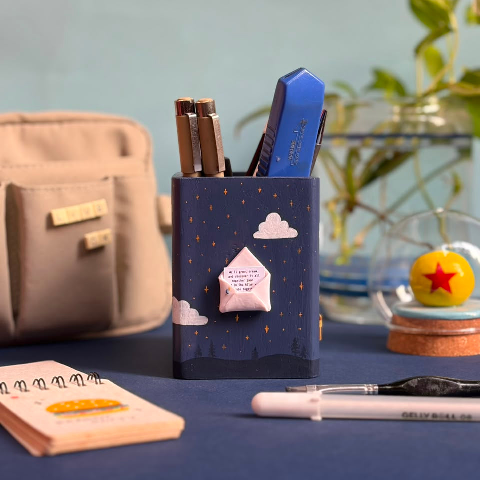 Side view showing tiny envelope message on personalized pen holder