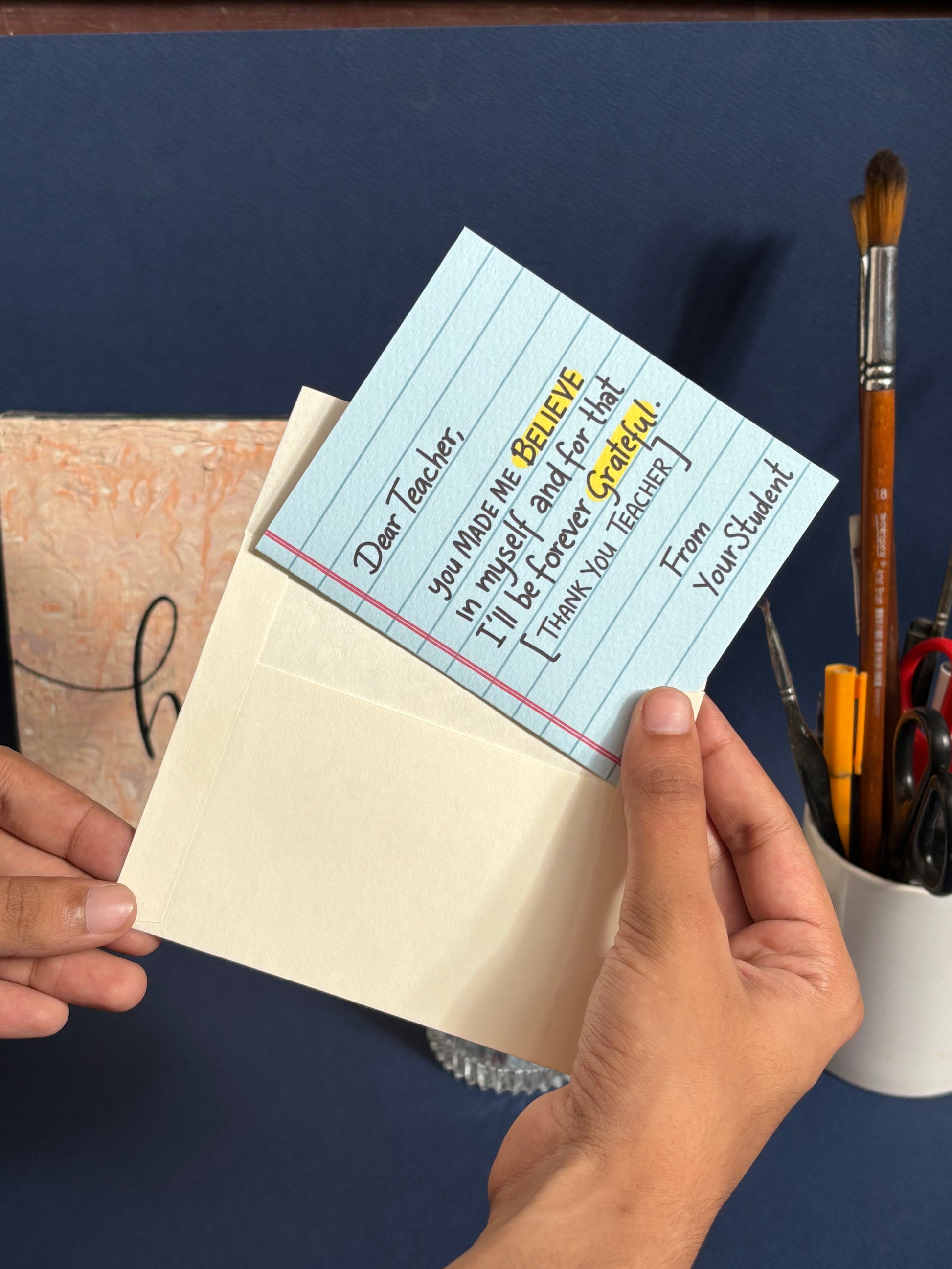 Teacher appreciation card shown with envelope