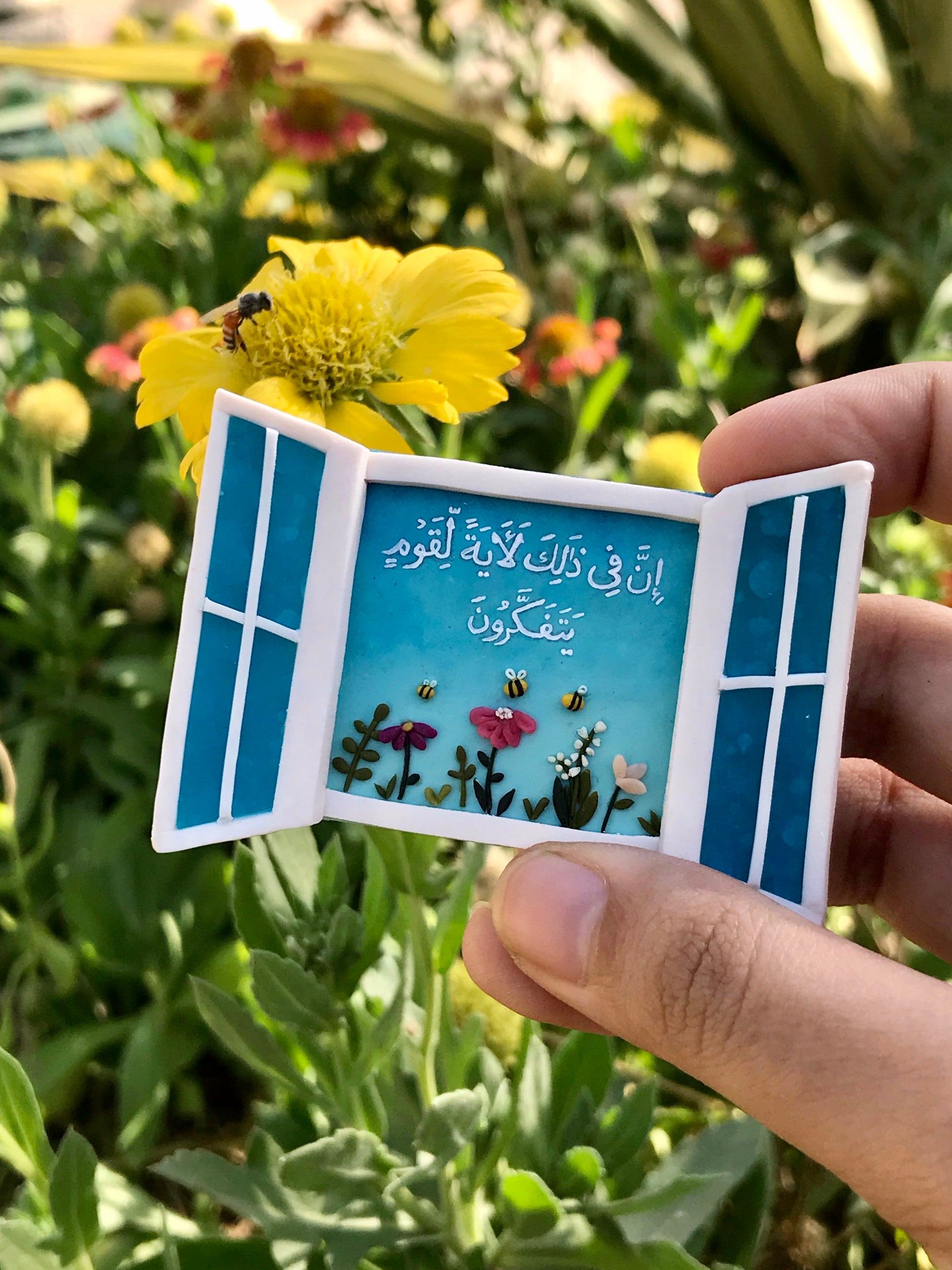 Close-up detail of Window to Blessing fridge magnet Version 1